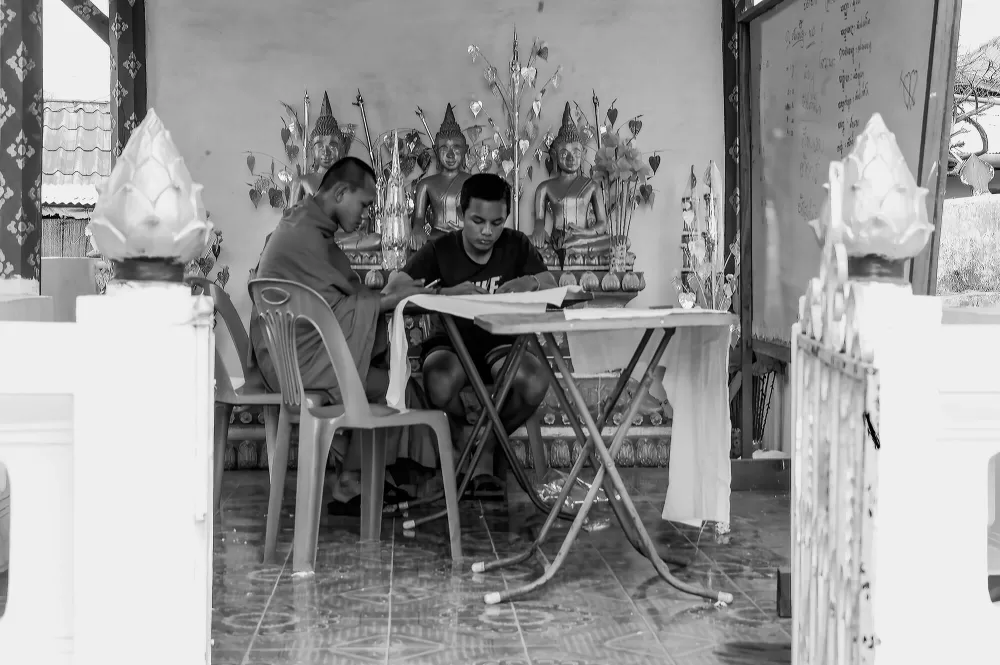 2019, Mönch und Lernender in Laos.