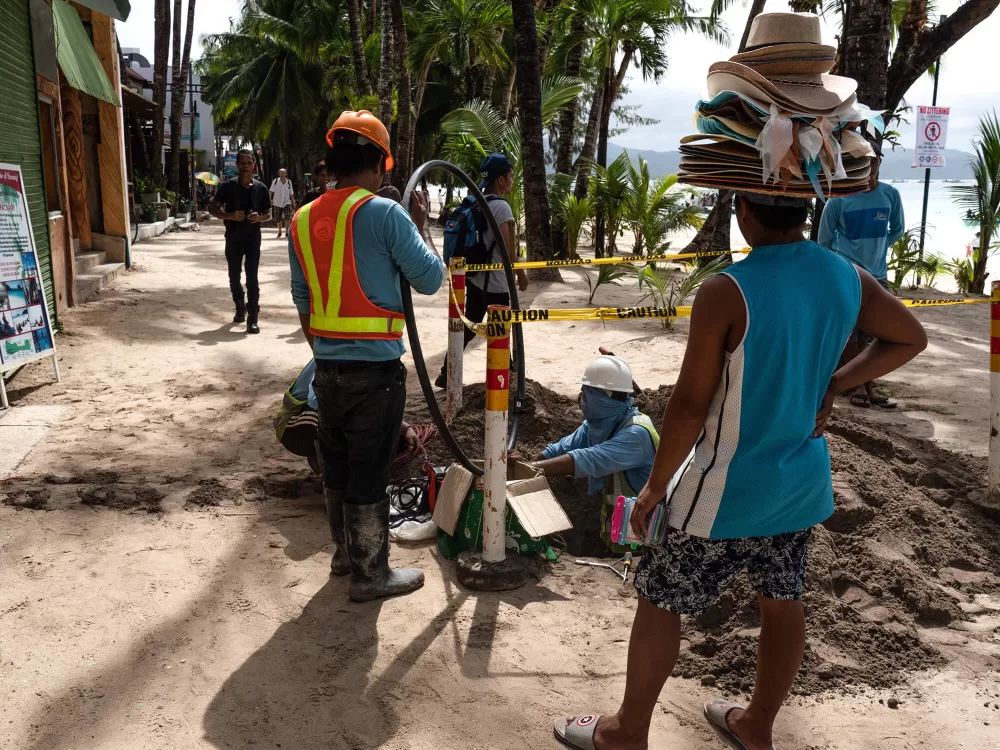 Boracay, Hutverkäufer und Bauarbeiter.