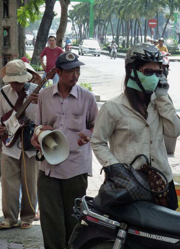 Strassenmusiker in Ho Chi MInh